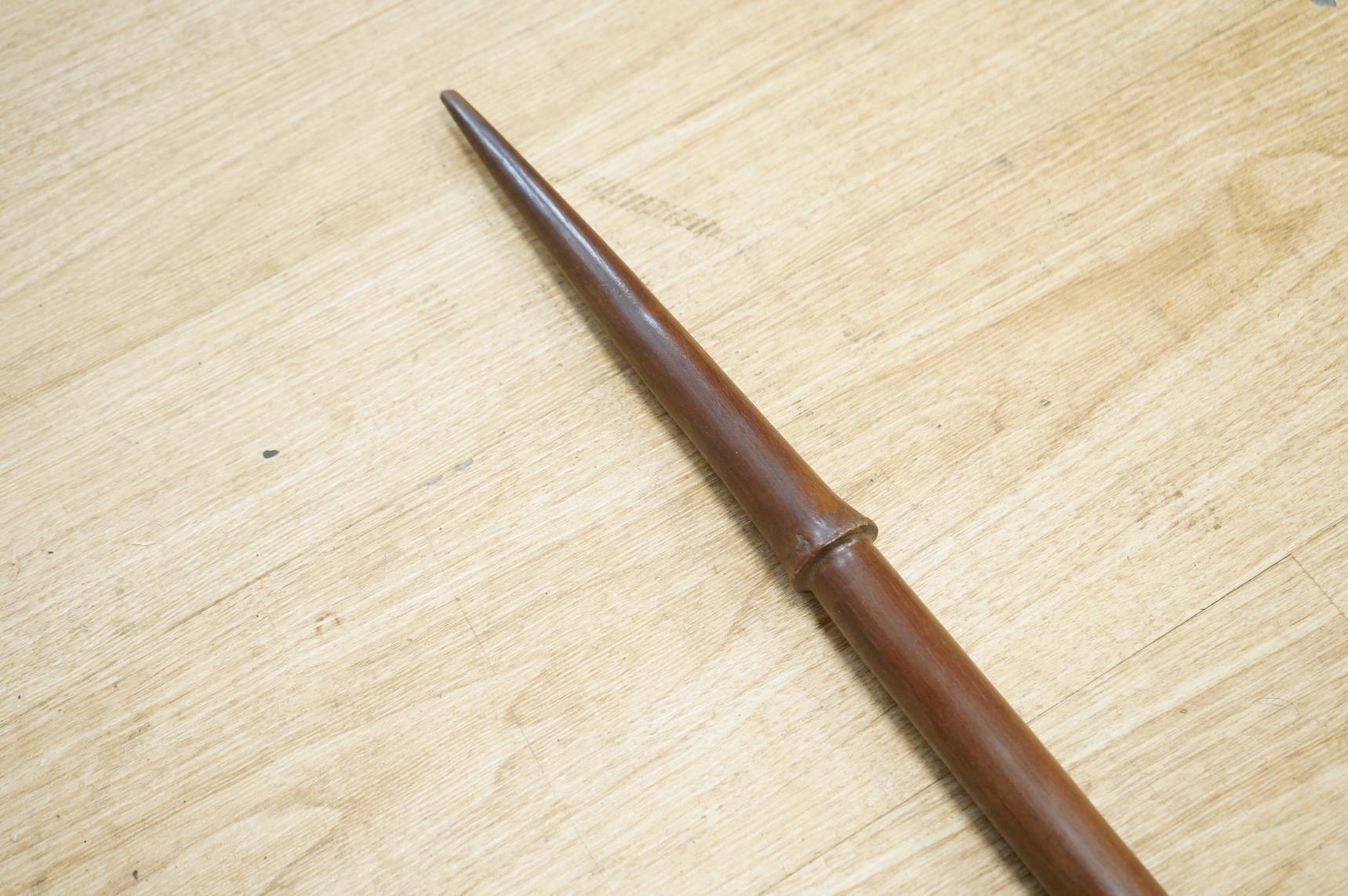 Polynesia - A Niue club with a tapering shouldered blade, early 20th century, 205cm long